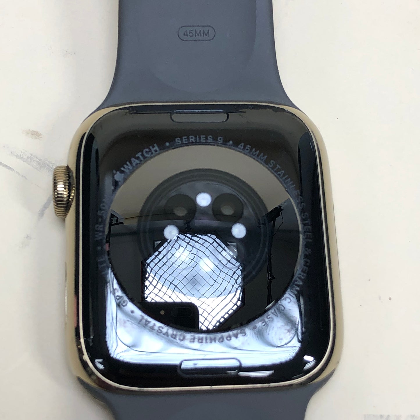 GPS Only Apple Watch Series 9 45MM Gold Stainless Steel Black Sport Band A2984