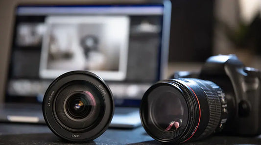 Camera lenses displayed in store at PayMore Rockville