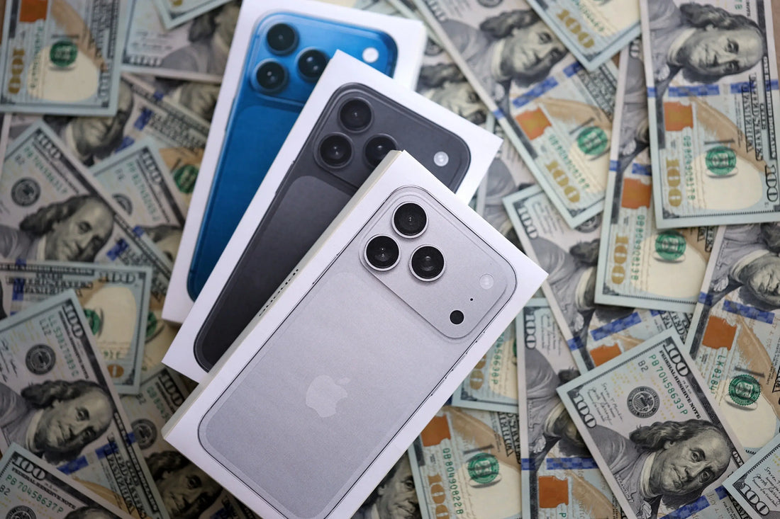 Assorted iPhone 11 and newer models presented for resale at PayMore Rockville