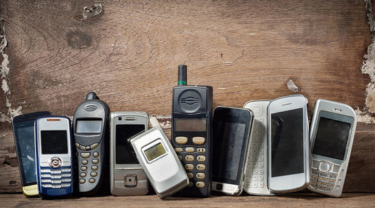 Collection of used smartphones ready for reuse and reselling at PayMore Rockville